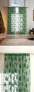 Detail of green Christmas lace curtain with embroidered llama, trees and festive holiday message