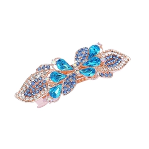 Rose gold butterfly hair clip with blue water-drop crystals and sparkling rhinestones