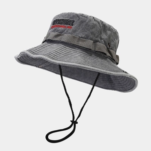 Detail of grey washed sun hat featuring Offshore embroidery and adjustable chin strap