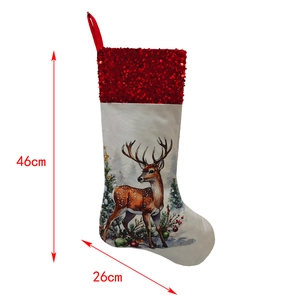 Detail of white Christmas stocking with reindeer pattern and 46cm height dimensions
