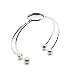 Silver stainless steel double-wire cuff bracelet with ball ends and a round bezel setting