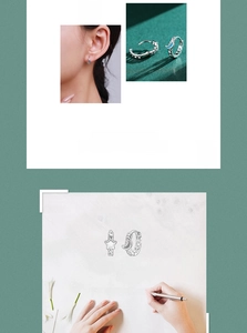 Detail of S925 sterling silver moon ear buckle with blue enamel inlay and star sketch