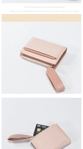 Detail view of pink pebbled leather card wallet with zip pocket and wrist strap