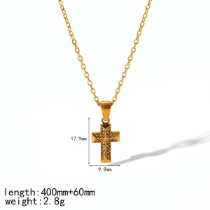 18k gold plated stainless steel cross necklace with crystal pavé on white background