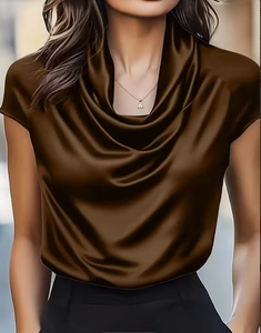Close-up of elegant cowl neck detail on a dark brown satin short sleeve blouse for women