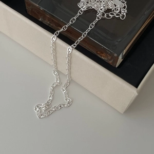 Minimalist S925 sterling silver anchor chain necklace with a polished metallic finish