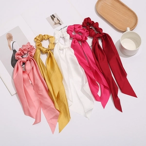 Five silk satin scrunchies with long ribbons in pink, yellow, white, rose, and red colors