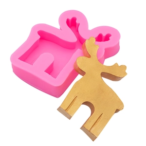 Pink silicone elk mold for DIY Christmas soap and resin crafts with golden reindeer finish