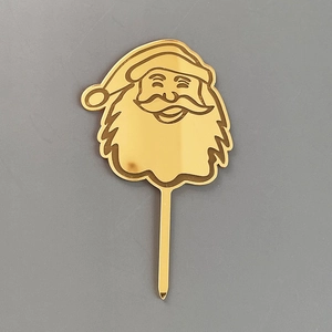 Topper de gateau pere noel en acrylique dore pour decoration de fete de noel et de desserts.