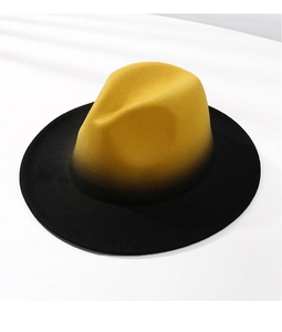 Detail view of the yellow and black gradient wool felt jazz hat with flat brim design