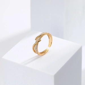 Macro shot of S925 sterling silver mark and micro-pave zircons on a gold-plated ring