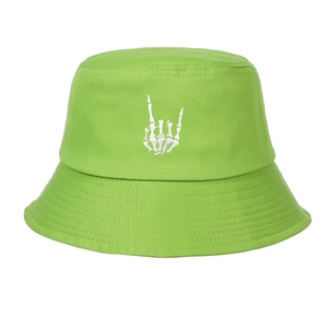 Close-up of rock bone gesture embroidery on bright green cotton canvas bucket hat