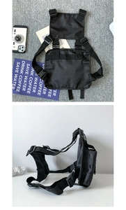 Detail view of black tactical chest bag showing nylon structure and adjustable straps
