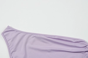 Detailed view of the double-needle stitching and lavender elastic fabric on the shoulder