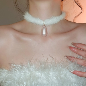Detail of soft white plush choker with a delicate pink teardrop pearl pendant