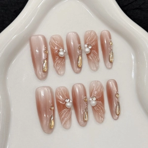 Handmade ballet-style cat eye press-on nails with 3D relief, pearls and gold crystals
