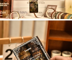 Detail of vintage floral and landscape washi tape with premium gift box packaging
