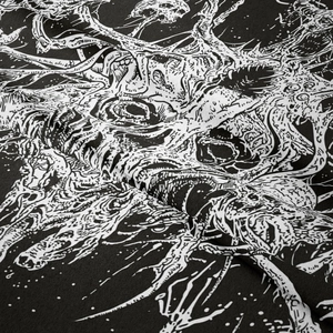 Close-up of black and white skull tapestry showing detailed fabric texture and patterns