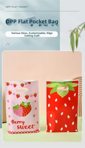 Detail of strawberry print gift bags with die-cut handles and Berry Sweet design