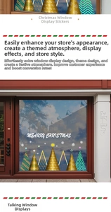 Detail of gold Christmas tree window decals with Merry Christmas lettering on glass