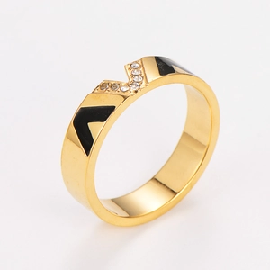 Minimalist V-shaped gold plated ring featuring black enamel and sparkling zircon stones