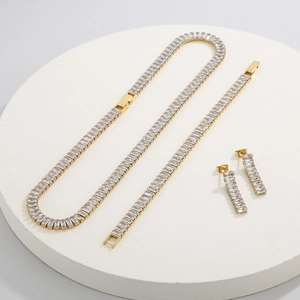 Luxurious gold-tone stainless steel jewelry set with sparkling zircon crystal stones