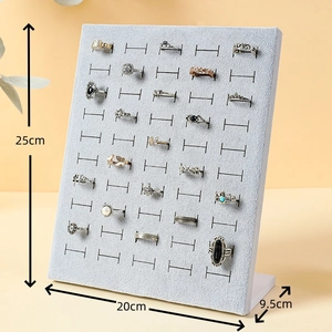 L-shaped velvet ring display stand in light grey with clear size dimensions