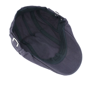 Navy blue cotton flat cap for men and women featuring adjustable metal side buckles