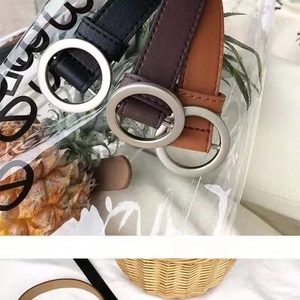 Minimalist women PU leather belts with round silver buckles in black and brown shades