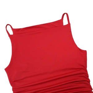 Detail of red summer dress showing thin straps, flat neckline and shirred elastic fabric