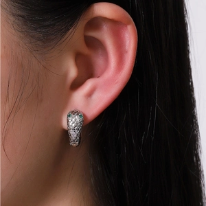 Unisex silver snake hoop earrings with green gem eyes and realistic scale textures