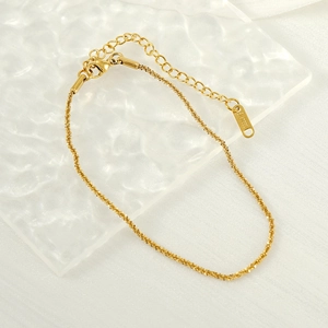 Bracelet de cheville scintillant en acier titane doré avec fermoir sur verre texturé