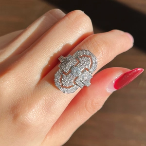 Vintage Art Deco cocktail ring with sparkling zircons worn on model's hand