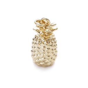 Detail shot of golden pineapple charm with textured finish for DIY jewelry crafting