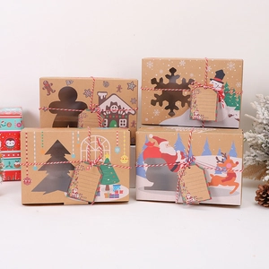 Detail of Christmas kraft paper gift boxes with festive patterns, cotton ropes and tags