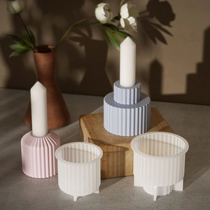 Detailed view of striped silicone molds for candle holders with textured finish