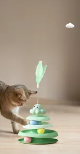 Detailed view of 3-layer cat track toy with colorful balls and a spring feather top