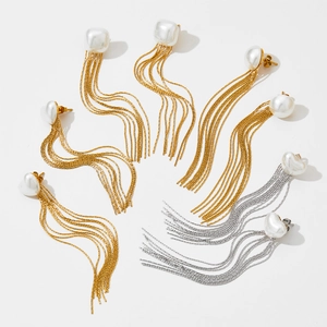 Elegant long tassel drop earrings with white pearls and hanging chains on white background