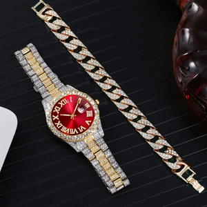 Detail of luxury iced-out watch with red dial and matching crystal cuban link bracelet