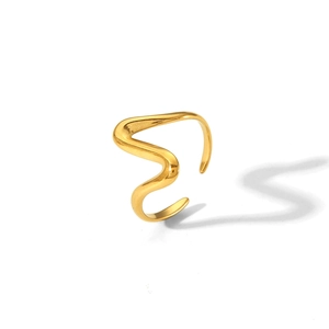 Detailed view of adjustable golden wave ring with premium hammered texture finish