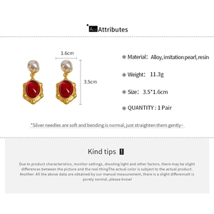 Detailed size specifications for vintage red resin oval earrings with faux pearls