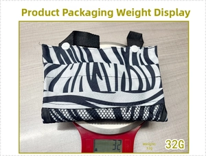 Lightweight zebra print toy storage bag weighing only 32g on a red digital scale