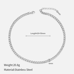 Macro detail of silver stainless steel Cuban chain necklace with dimensions 420+50mm length