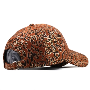 Detailed back view of leopard print baseball cap featuring an adjustable metal buckle