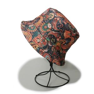 Detail of vintage paisley print and cotton fabric texture on summer bucket hat