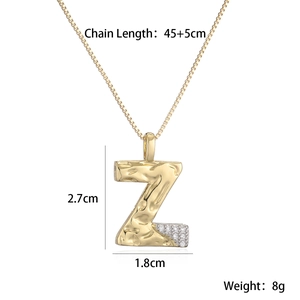 Detail of gold letter Z pendant with hammered texture, zircon stones and chain dimensions
