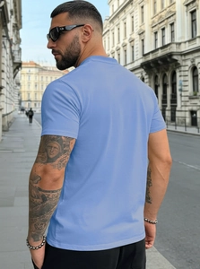 Detail of sky blue short-sleeved cotton Henley t-shirt for men in slim fit style