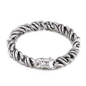 Polished silver twisted chain bracelet in 316L stainless steel for men on white background