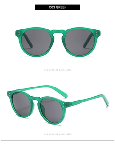 Macro detail of retro green sunglasses with Boston frame and silver rivet accents