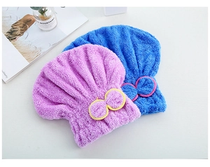 Détail de bonnets de séchage en polaire corail épaisse violet et bleu avec nœuds
